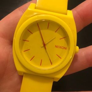 Nixon Time Teller Yellow Watch Red Letters